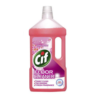 A bottle of CIF Floor Cleaner with a label showing an orchid flower and the scent of Wild Orchid. The bottle is predominantly pink with green accents and the CIF logo at the top.
