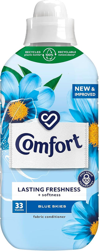 A bottle of Comfort fabric conditioner with a blue label featuring floral graphics and the scent name 'Blue Skies'.
