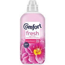 Pink bottle of Comfort fresh fabric softener with floral design on a white background