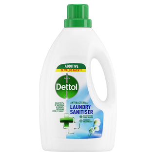 A bottle of Dettol Laundry Sanitiser with a label showing a green and blue design and text indicating it is an antibacterial laundry sanitiser in a Fresh Cotton scent.