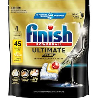 A package of Finish Powerball Ultimate Plus dishwasher detergent tabs in Lemon Sparkle scent. The packaging is primarily gold and black with the blue and red Finish logo in the center, and an illustration of a wine glass on the right.